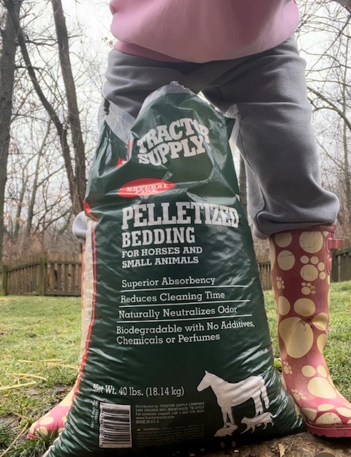 pine pellets are a cheap way to soak up water and mud in your yard